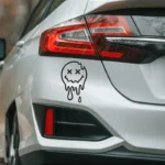 Automobilių lipdukas šypsena kryžiukai ant automobilio