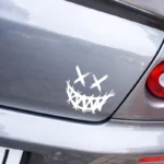 Automobilių lipdukas pikta šypsena ant automobilio